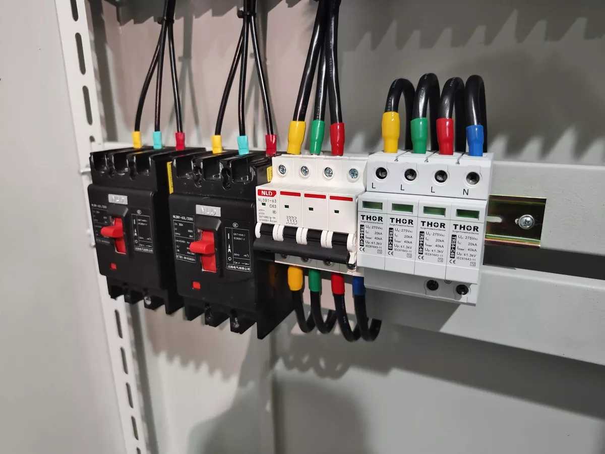 Thor SPDs installed in industrial distribution panel showing indicator windows for surge protection device maintenance