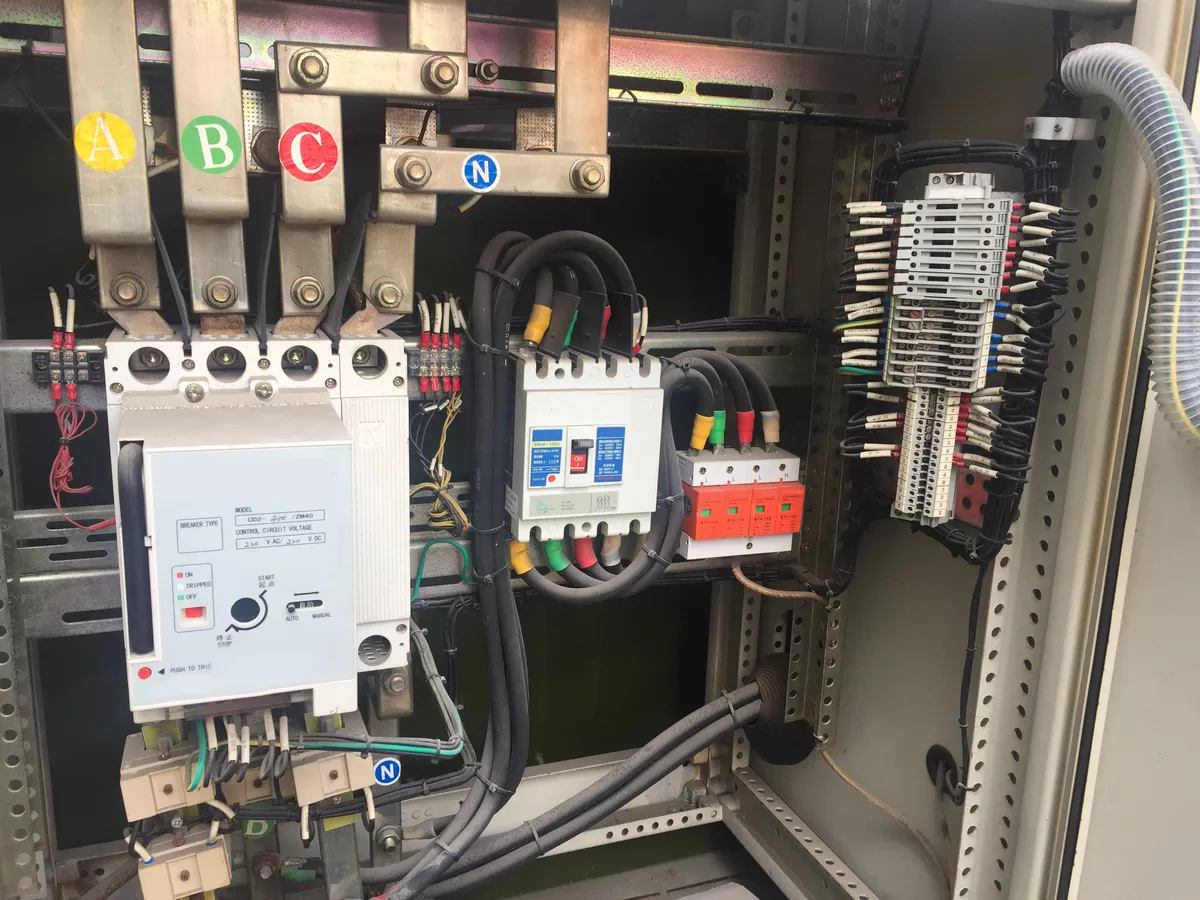 Representative industrial distribution panel with DIN-rail SPDs for industrial surge protection