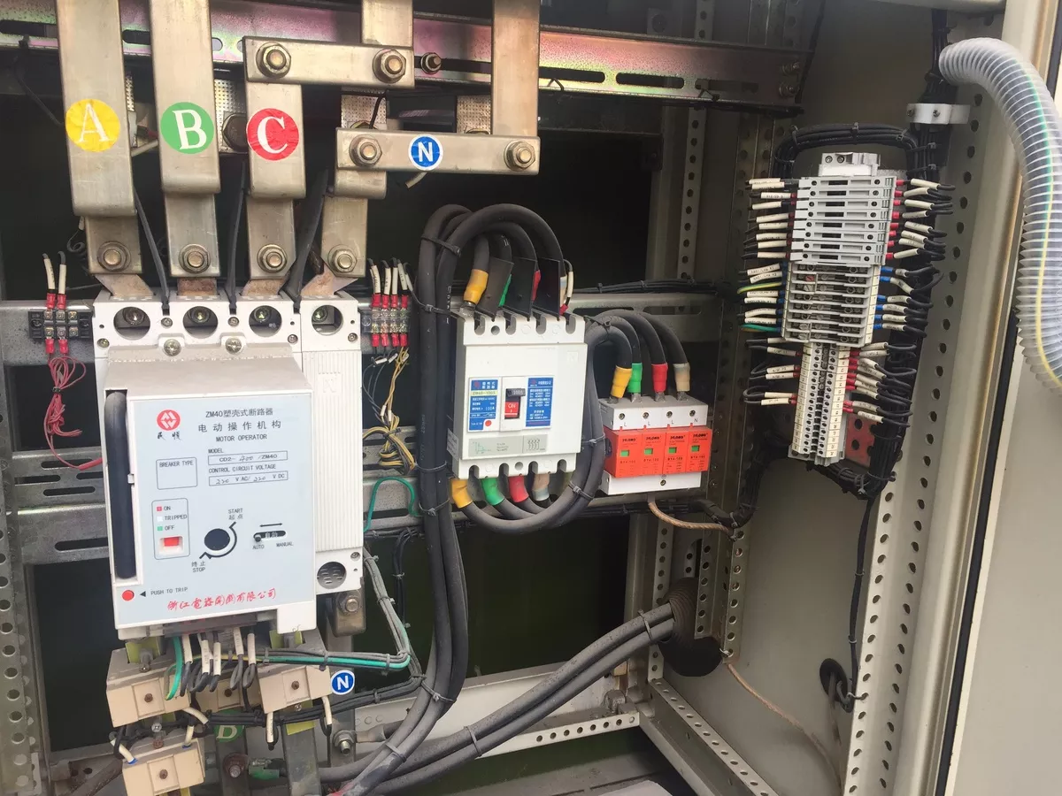 Representative industrial distribution panel with DIN-rail SPDs for industrial surge protection