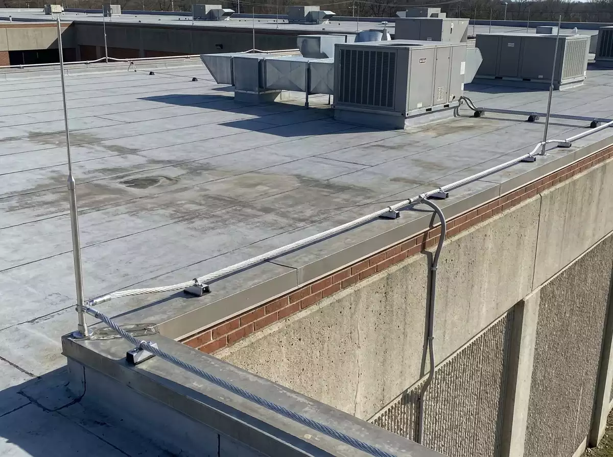 Commercial rooftop lightning protection system with air terminals and down conductor
