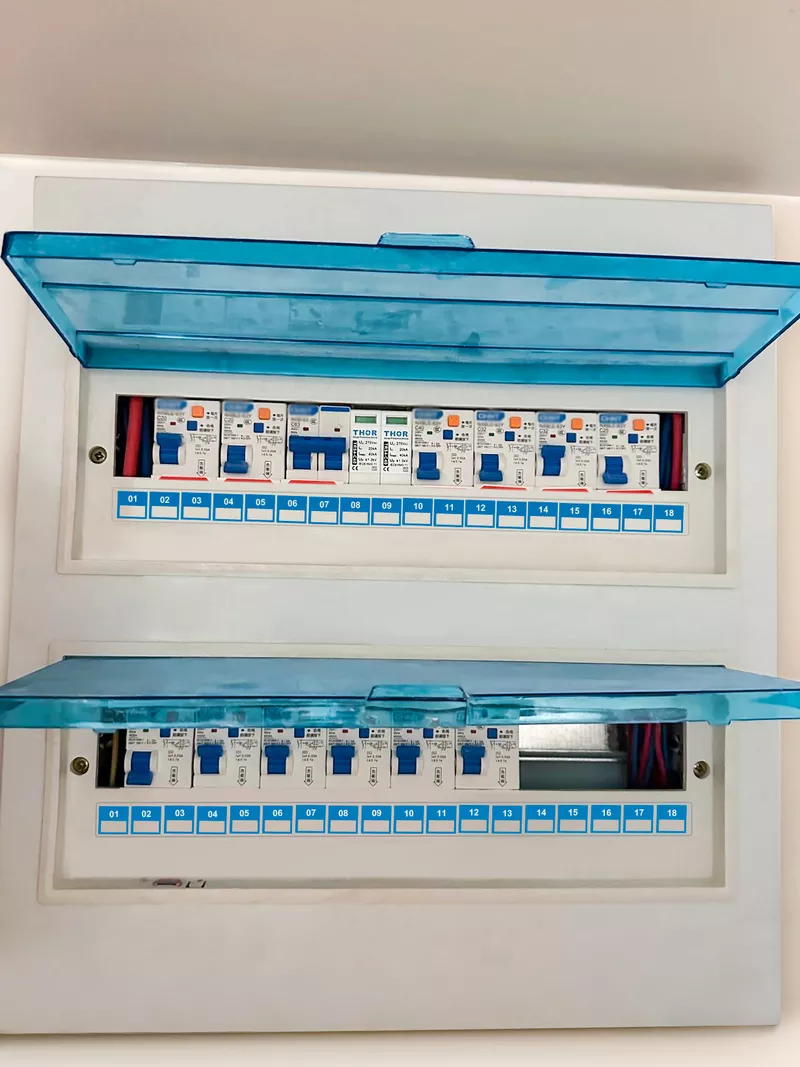Type 2 SPD installed on DIN rail in distribution board showing SPD parameters label